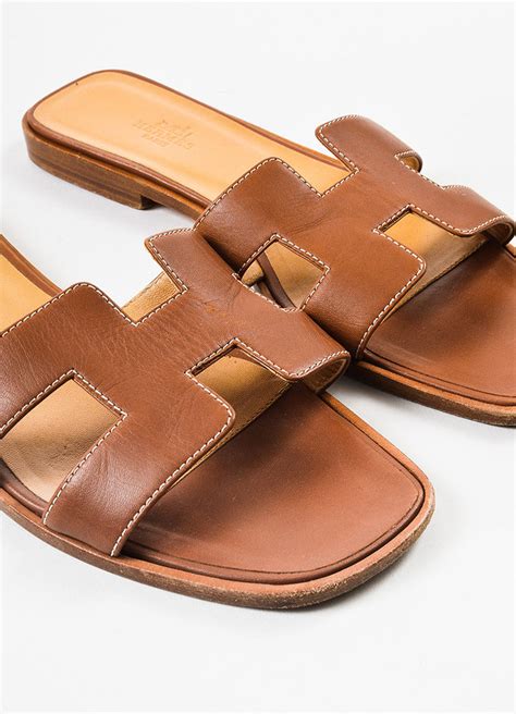 hermes oran sandals black or brown